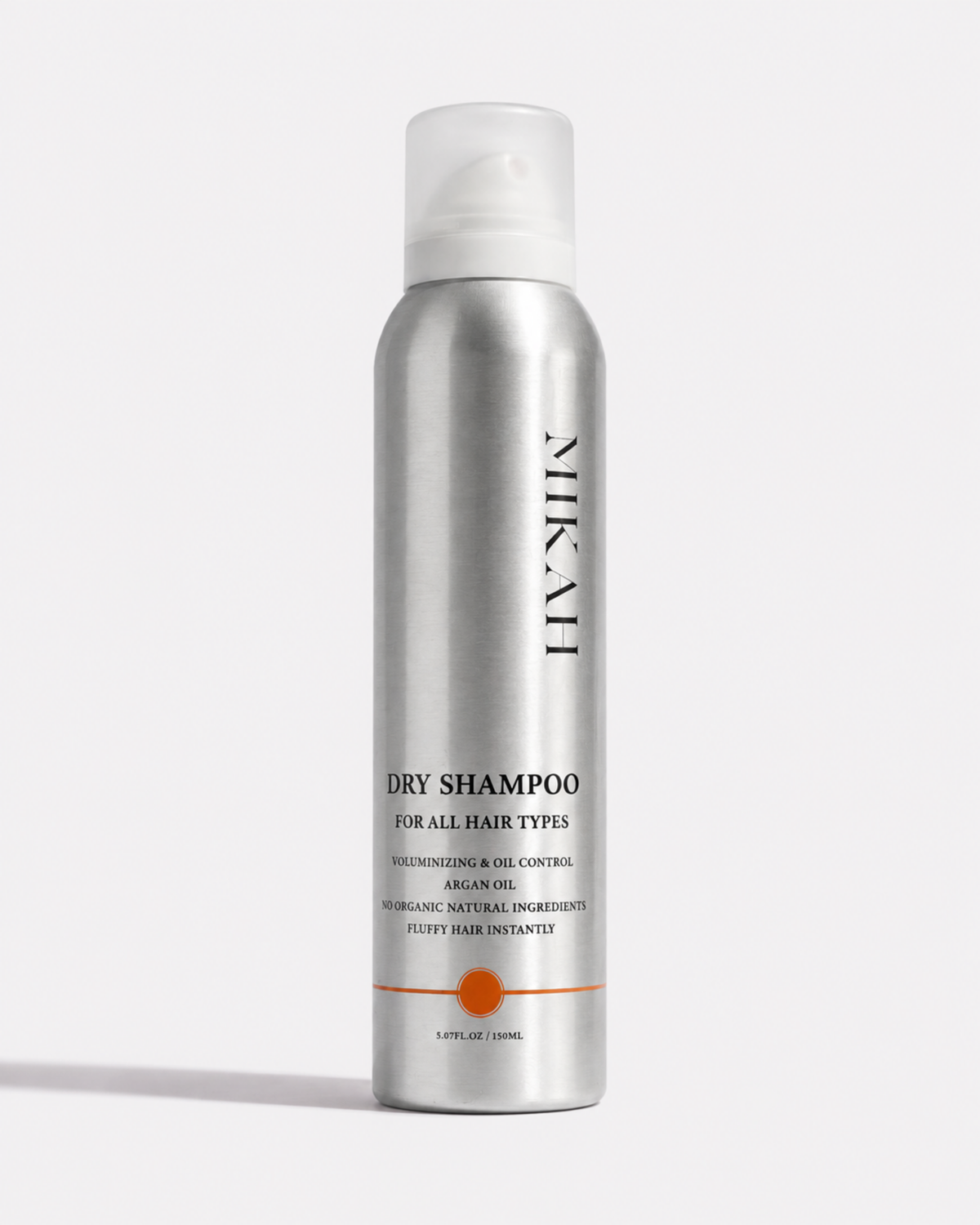 MIKAH Dry Shampoo 150ml silver spray can with white cap on a light background