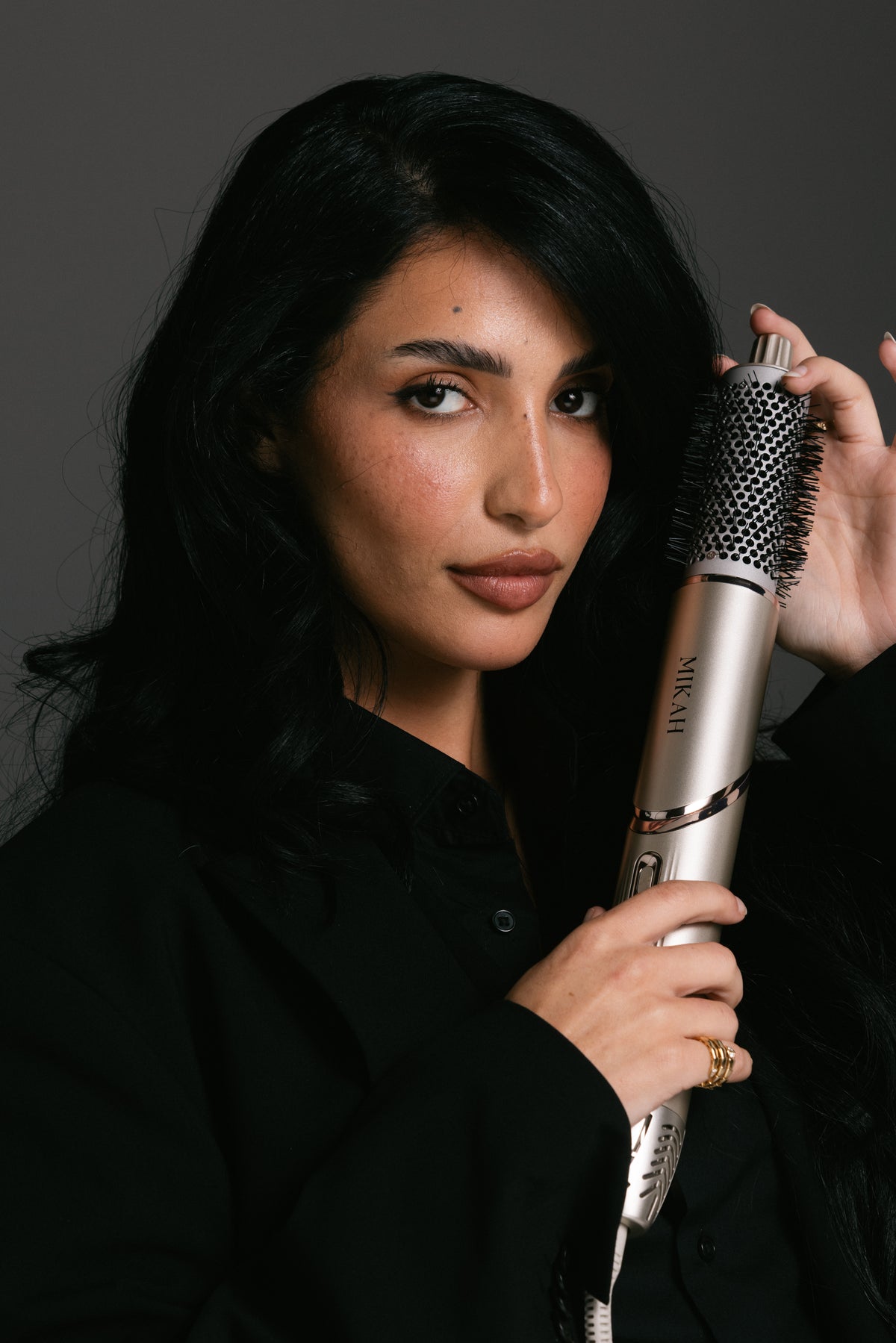 MIKAH 6-in-1 Air Styler used to create smooth, voluminous hairstyles