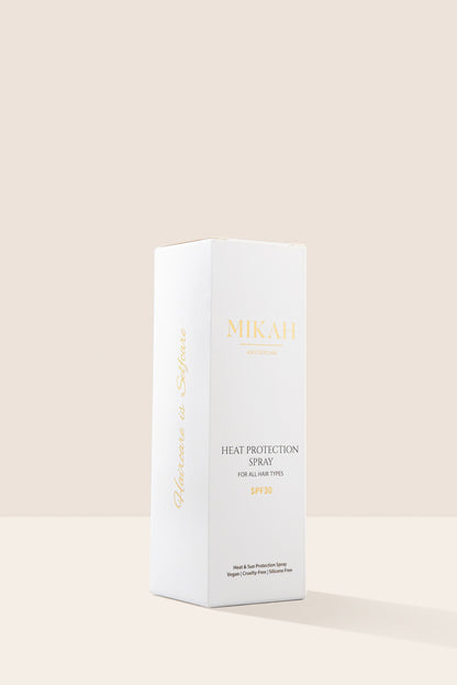 MIKAH Heat &amp; Scalp Protection Spray with white product packaging