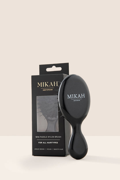 MIKAH Mini Hairbrush Black with branded product packaging
