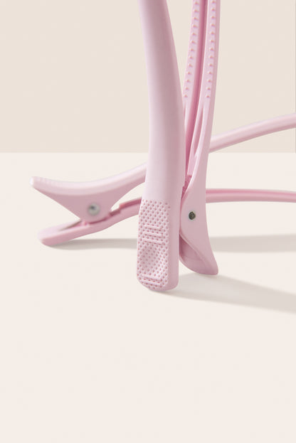 Close-up of MIKAH Pink Hair Sectioning Clips