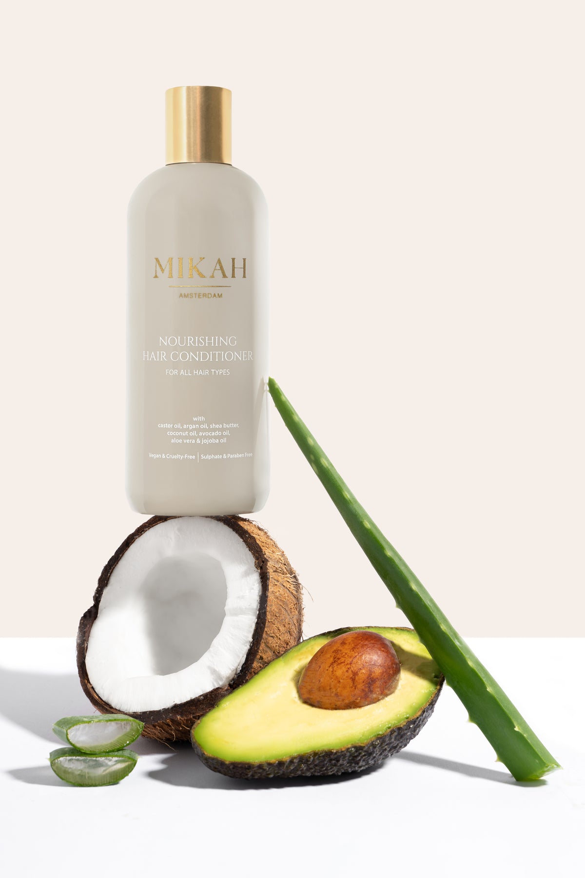 MIKAH Nourishing Hair Conditioner displayed with botanical ingredients