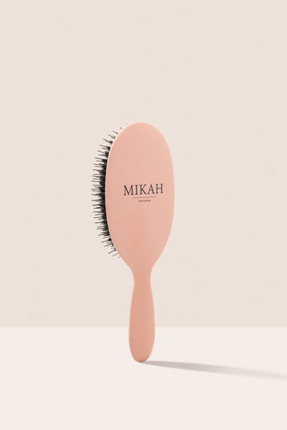 MIKAH Paddle Nylon Hairbrush in pink – front view